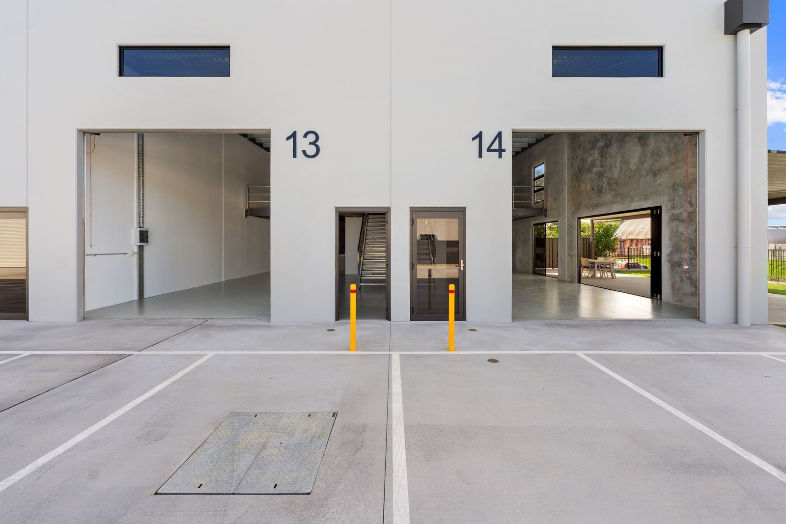 Factory unit interior with mezzanine and kitchenette — Townsend shed for lease at Pacific Woods Estate NSW 2463